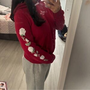 Red Hoodie with White Floral Sleeve Design